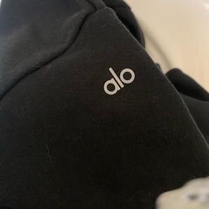 Black Alo yoga cropped sweatshirt with elbow cut outs. Medium